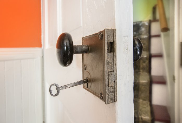 old fashioned turnkey in keyhole door